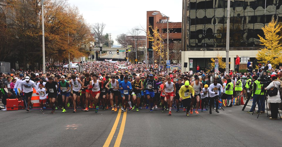Runners racing off the starting line at the Drumstick Dash in Roanoke, VA.