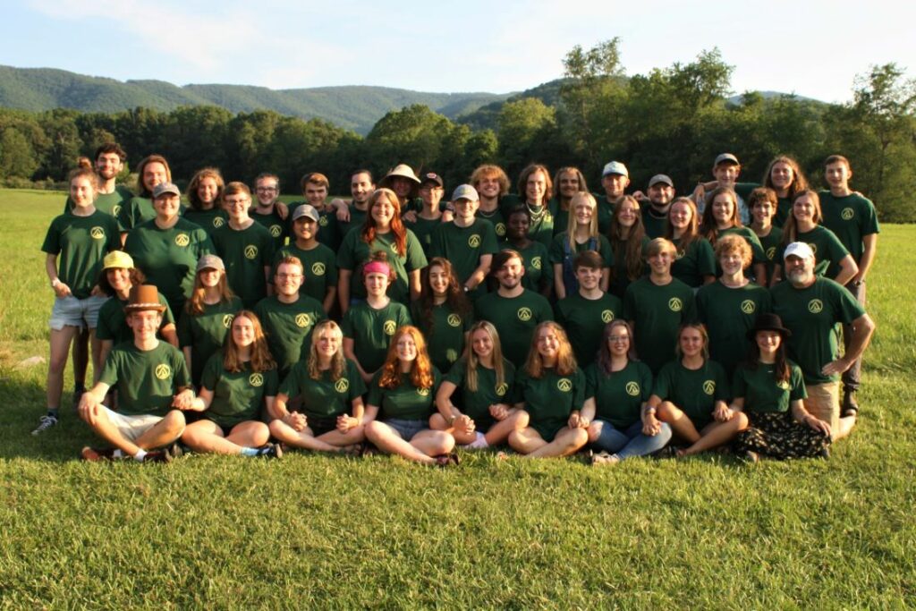 Group of smiling, posed camp counselors 